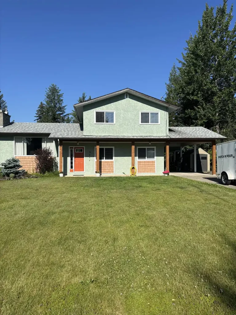 Home exterior painted light green