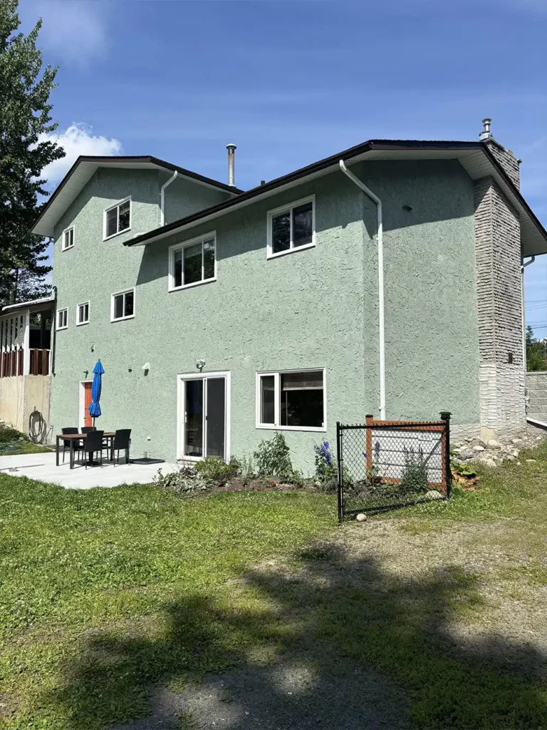 Home exterior painted light green